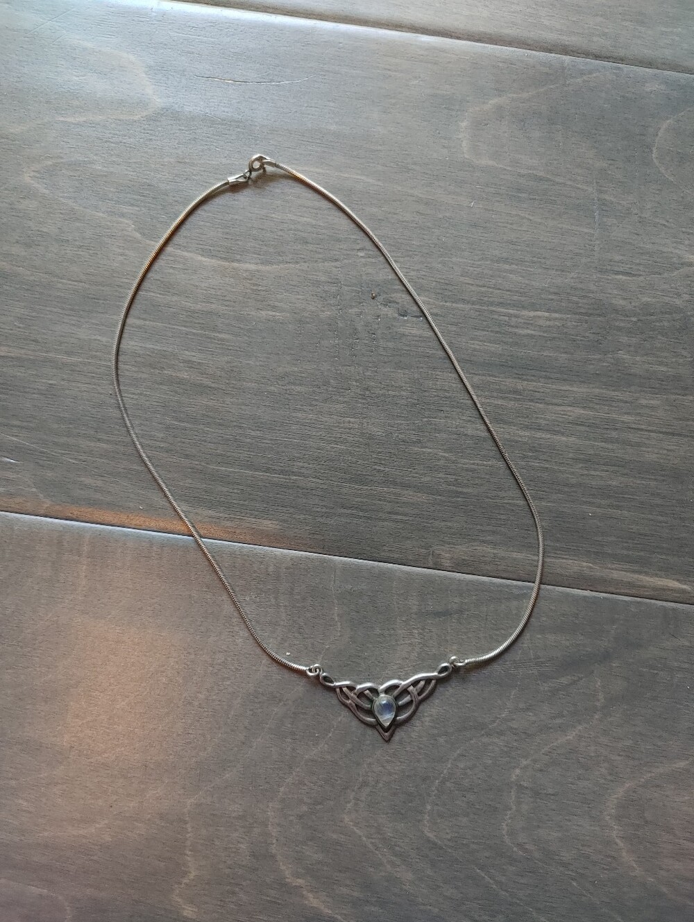 Sterling Silver Celtic Teardrop Necklace with Light Blue Stone